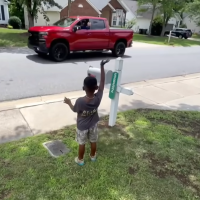 Four-year-old boy teaches his neighbors to love