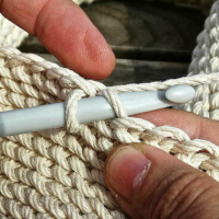 Hardcore gangster finds peace through yarn.