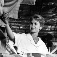 Debbie Reynolds selects fabrics for her originals